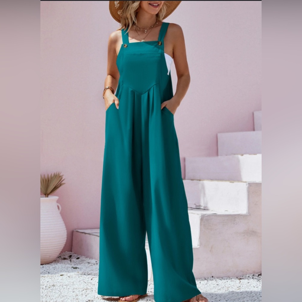 ***SOLD*** Super cute jumpsuit size large. Brand new, never worn.
